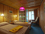Гостиница Байкальские дюны. Спальня в номере первого класса